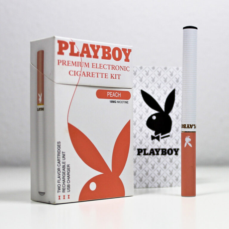 Playboy-branded electronic cigarette kit box next to a slim e-cigarette